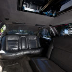 A car with leather seats and a black window.