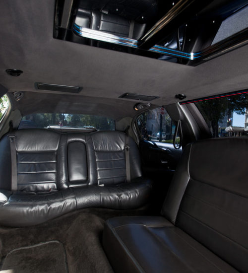 A car with leather seats and a black window.
