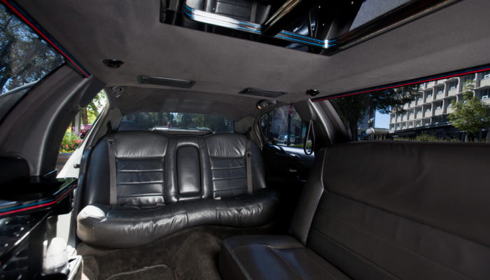 A car with leather seats and a black window.